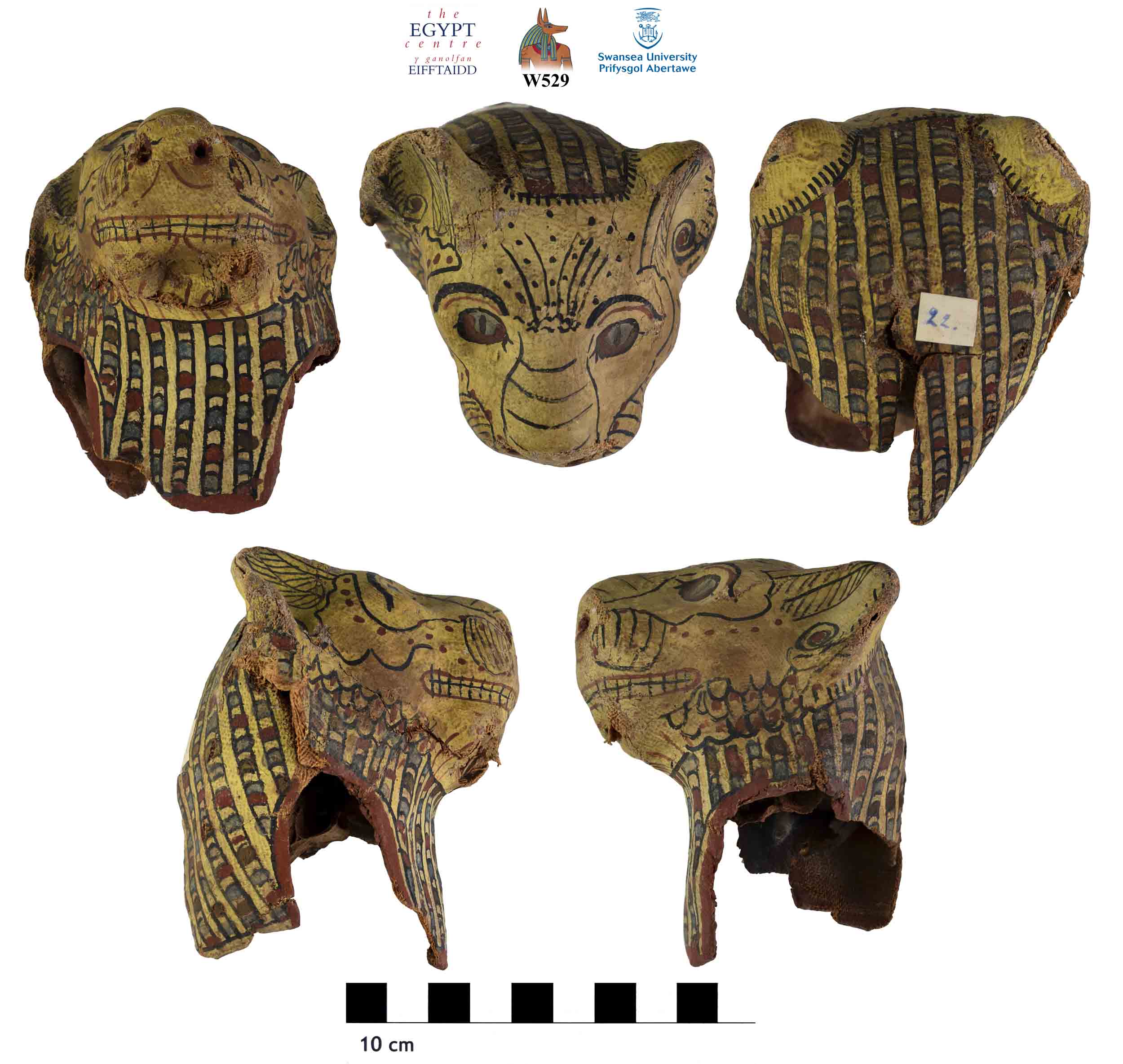 Image for: Cartonnage mask of a cat with remains of skull inside